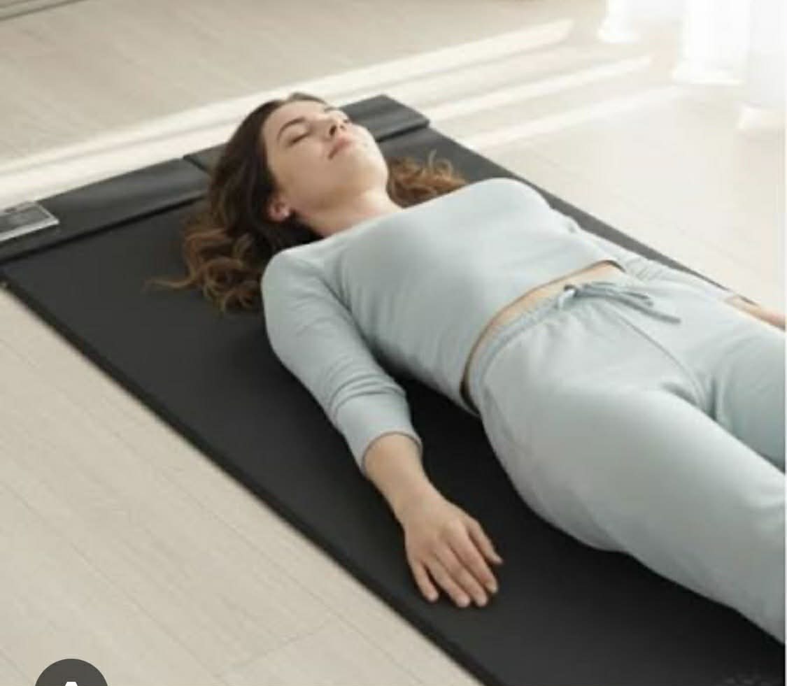 Client relaxing on the Centropix KLOUD PEMF Mat at Soothe Bella Spa